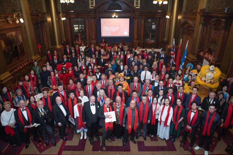 Guests celebrating the Lantern Festival at Edinburgh City Chambers.